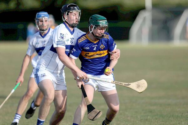 Castletown's Ryan Peters gives Sean Hayes (Clough/Ballacolla) no room to manoeuvre in their PIHC Rd 3 game Photo: David Maher Castletown's Ryan Peters gives Sean Hayes (Clough/Ballacolla) no room to manoeuvre in their PIHC Rd 3 game Photo: David Maher