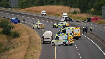 Number of people killed and four injured following two-vehicle crash on M9