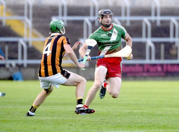 Aaron Dunphy (Borris/Kilcotton) looks for a way past Camross defender Conor Mortimer in their SHGC Rd 4 game on Saturday	Photo: Denis Byrne