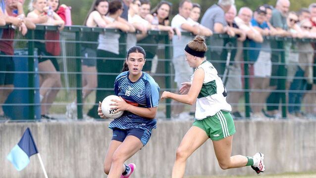 <p>Aideen Gee (Ballyroan) looking to evade the attention of Sarah McDonald (Portlaoise) 	 Photo: Denis Byrne</p>