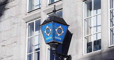 Garda charged with soliciting murder of woman and three children