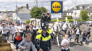 <p>The cortege makes its way to St Michael's Cemetery in Athy </p> <p>The cortege makes its way to St Michael's Cemetery in Athy </p>