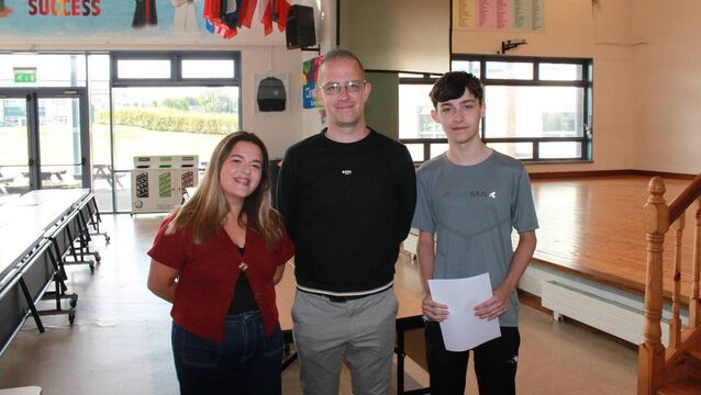 <p>Portlaoise College students collect their results</p>