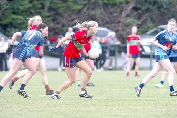 Timahoe's Aishling Donoher gets ready to pass the ball in their Senior Championship win over Ballyroan Photo: Denis Byrne Timahoe's Aishling Donoher gets ready to pass the ball in their Senior Championship win over Ballyroan Photo: Denis Byrne