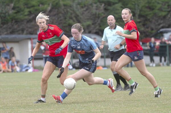 Kate Kenna (Ballyroan) gaining possession ahead of Aishling Quigley (Timahoe) Photo: Denis Byrne Kate Kenna (Ballyroan) gaining possession ahead of Aishling Quigley (Timahoe) Photo: Denis Byrne