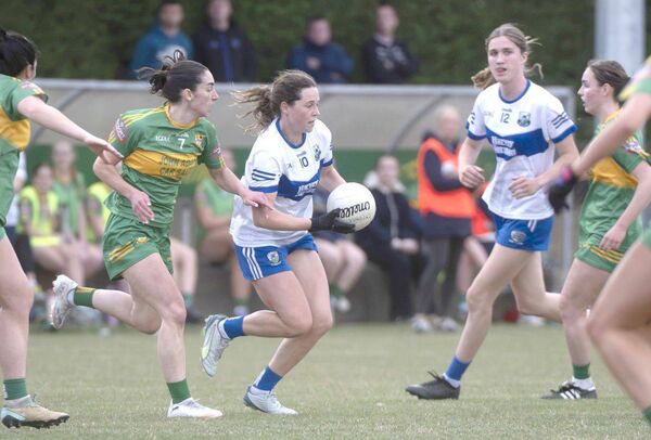 Laura Carroll (St Conleth's) is chased down by Aideen Delaney (Park/Ratheniska) 	 Photo: Denis Byrne