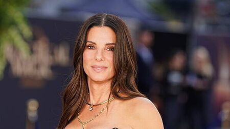 Sandra Bullock: ‘All the people in the world will never amount to Dolly Parton’