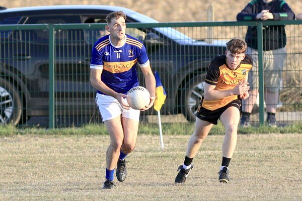 O'Dempsey's Pat Maher looks up for some support in their Junior Championship win over The Heath on Wednesday Photo: David Maher O'Dempsey's Pat Maher looks up for some support in their Junior Championship win over The Heath on Wednesday Photo: David Maher