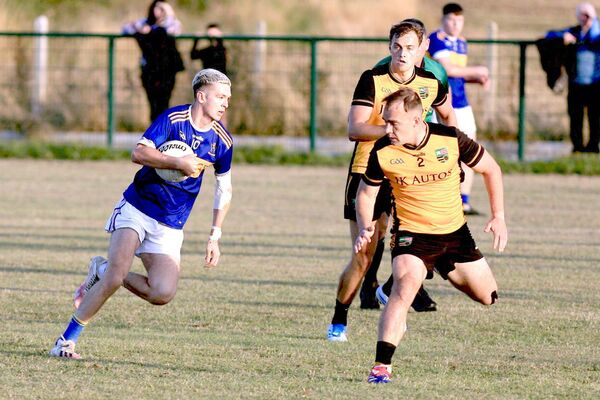 O'Dempsey's Conor Kearney looks to get past The Heath's David Phelan on Wednesday night Photo: David Maher O'Dempsey's Conor Kearney looks to get past The Heath's David Phelan on Wednesday night Photo: David Maher