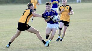 <p>The Heath's Dan Hennessy attempts to put a halt to Ben Stapleton's (O'Dempsey's) progress Photo: David Maher</p> <p>The Heath's Dan Hennessy attempts to put a halt to Ben Stapleton's (O'Dempsey's) progress Photo: David Maher</p>
