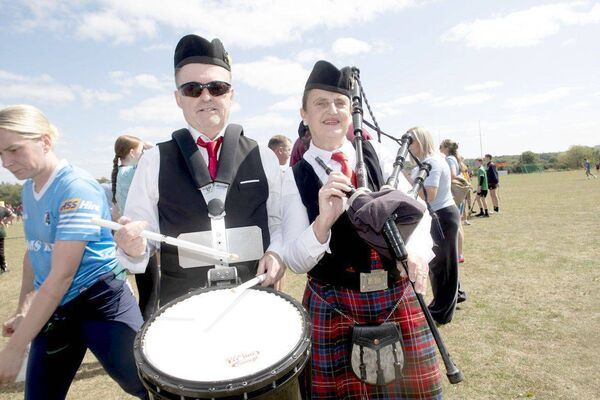 Ciaran O'Brien and Brigid Maher (Cullohill and Durrow District Pipe Band) who led the teams onto the pitch on Sunday