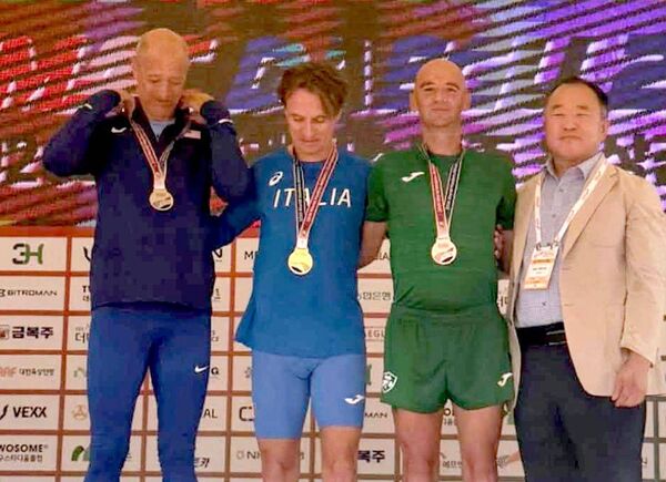Stephen Hunter on the podium after a bronze medal in the 3000m Steeplechase