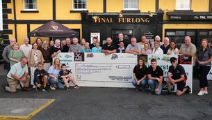 <p> Organisers and volunteers from the Fisherstowm Tractor and Truck Run outside the Final Furlong pub for the presentation of cheque for €42, 568.57 to members of the Laois Hospice committee Photos: Michael Scully </p> <p> Organisers and volunteers from the Fisherstowm Tractor and Truck Run outside the Final Furlong pub for the presentation of cheque for €42, 568.57 to members of the Laois Hospice committee Photos: Michael Scully </p>