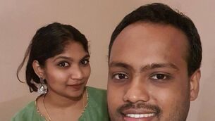 <p>Jackon Kuber Singh with his wife, Hari Priya. Jackson is recovering in hospital after being seriously injured when he was mowed down by a stolen vehicle </p>