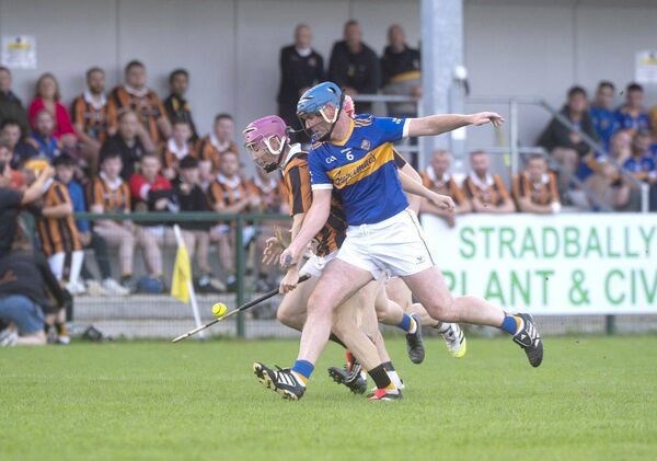 Ben Cordial Lambe (Camross) and Brendan McEvoy (Clough/Ballacolla) compete for this sliotar 	Photo: Denis Byrne