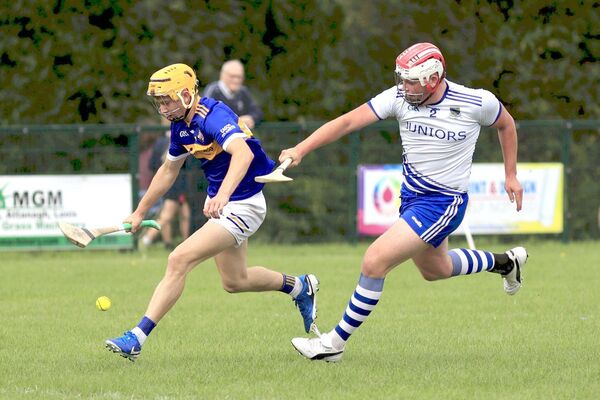 Clough/Ballacolla's John Coonan wins the race agaonst Rory Culleton (Mountmellick) for possession of the sliotar in their PIHC game on Saturday Photo: David Maher Clough/Ballacolla's John Coonan wins the race agaonst Rory Culleton (Mountmellick) for possession of the sliotar in their PIHC game on Saturday Photo: David Maher