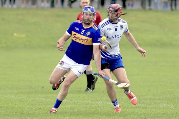 Sean Corby (Clough/Ballacolla) and Jack Gorman (Mountmellick) tussle for possession in their PIHC quarter-final on Saturday Photo: David Maher Sean Corby (Clough/Ballacolla) and Jack Gorman (Mountmellick) tussle for possession in their PIHC quarter-final on Saturday Photo: David Maher