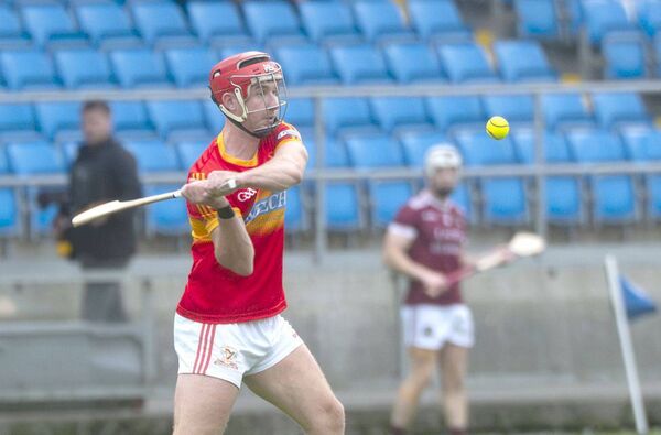 Ciaran Comerford (Harps) pointing this effort in their Senior Championship win over Ballinakill Photo: Denis Byrne Ciaran Comerford (Harps) pointing this effort in their Senior Championship win over Ballinakill Photo: Denis Byrne