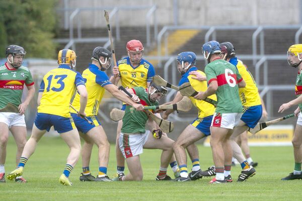 There's no way out for Michael Cleary (Rathdowney/Errill) as he finds himself surrounded by Abbeyleix players in their SHC Rd 5 game at Laois Hire O'Moore Park on Sunday Photo: Denis Byrne There's no way out for Michael Cleary (Rathdowney/Errill) as he finds himself surrounded by Abbeyleix players in their SHC Rd 5 game at Laois Hire O'Moore Park on Sunday Photo: Denis Byrne