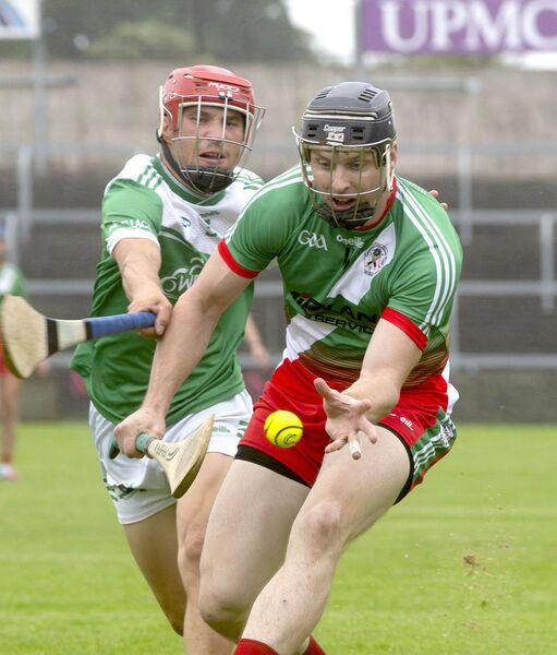 Joseph Campion (Borris/Kilcotton) securing this sliotar as Alex Marron (Rosenallis) moves to challenge Photo: Denis Byrne Joseph Campion (Borris/Kilcotton) securing this sliotar as Alex Marron (Rosenallis) moves to challenge Photo: Denis Byrne