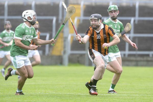 Dwane Palmer (Camross) drives past Ballyfin's Darragh Connolly on Saturday Photo: Denis Byrne Dwane Palmer (Camross) drives past Ballyfin's Darragh Connolly on Saturday Photo: Denis Byrne