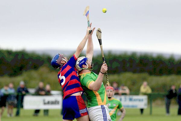 Reaching for the sky - Niall Brennan (Colt-Shanahoe) and Dan McCormack (Clonad) in their Premier Intermediate Hurling Championship quarter-final on Sunday	 Photo: David Maher