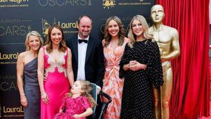 <p>Madison Gee and her parents Gordon and Gemma with Amy Huberman at the LauraLynn Oscars 2026. Photo: Andres Poveda </p>