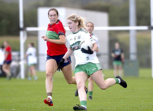 Ciara Byrne (Portlaoise) breaking with Mo Nerney (Timahoe) racing to challenge Photo: Denis Byrne Ciara Byrne (Portlaoise) breaking with Mo Nerney (Timahoe) racing to challenge Photo: Denis Byrne