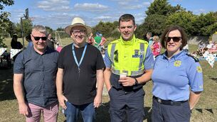 <p>Portlaoise community gardaí with Hawthorn Drive residents at the launch of a Neighbourhood Watch scheme, at a community fun day that also raised funds for a defibrillator in the estate</p>