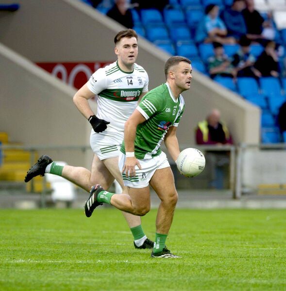 Evan Lowry (Killeshin) breaking away from Damon Larkin (Portlaoise) during the SGC quarter-final Photo: Denis Byrne Evan Lowry (Killeshin) breaking away from Damon Larkin (Portlaoise) during the SGC quarter-final Photo: Denis Byrne