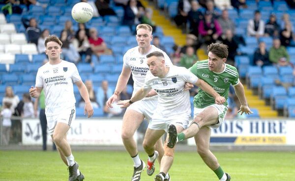 Fionn McEvoy (Stradbally) kicking for a score as Niall Donoher (Courtwood) attempts to block at Laois Hire O'Moore Park Photo: Denis Byrne Fionn McEvoy (Stradbally) kicking for a score as Niall Donoher (Courtwood) attempts to block at Laois Hire O'Moore Park Photo: Denis Byrne