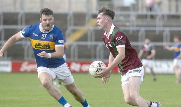 Hugh Connolly (Portarlington) in possession against O'Dempsey's at Laois Hire O'Moore Park Photo: Denis Byrne Hugh Connolly (Portarlington) in possession against O'Dempsey's at Laois Hire O'Moore Park Photo: Denis Byrne