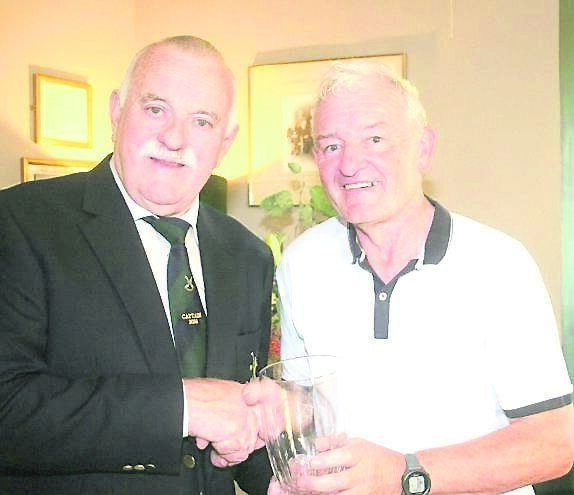 Society Captain Seamus Conroy presents Matthew Keegan with the Golfer of the Year award Society Captain Seamus Conroy presents Matthew Keegan with the Golfer of the Year award