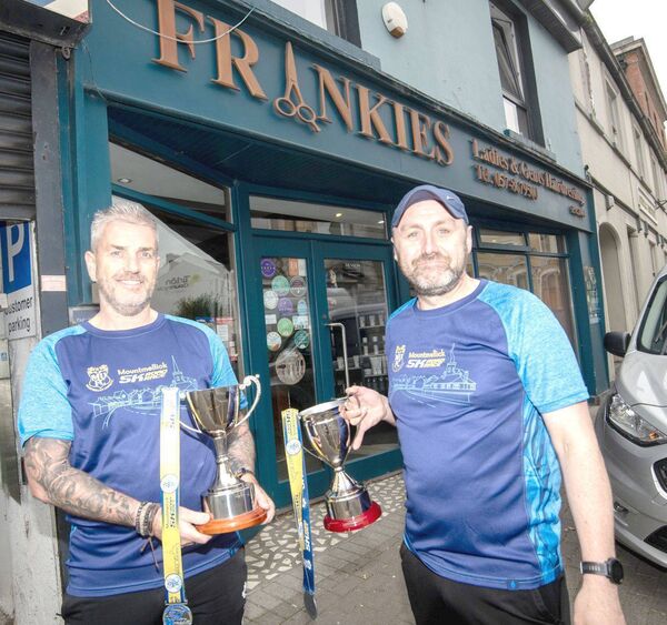 Pictured at Frankies Hair Salon (Sponsor) are Darren Brooks and Gary Devane Road Runner Athletic Club Mountmellick with The Noel Coss &amp; Michelle Oxley Perpetual Cups