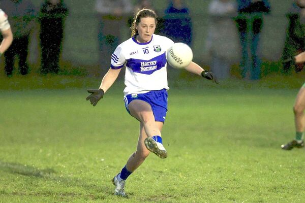 St Conleth's Marie Byrne gets a shot away in the LGFA SC quarter-final win over Portlaoise 	 Photo: David Maher