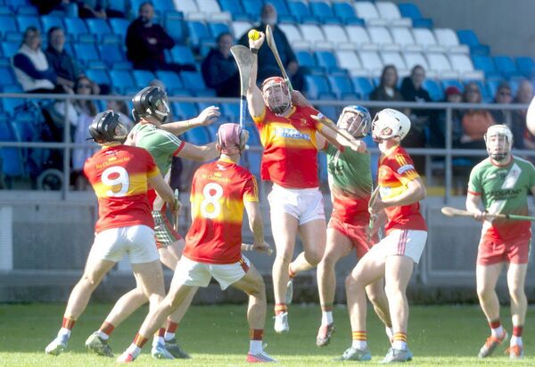 Ciaran Comerford (Harps) gets to grips with this sliotar in their Senior Hurling Championship quarter-final win over Borris/Kilcotton on Sunday Photo: Denis Byrne Ciaran Comerford (Harps) gets to grips with this sliotar in their Senior Hurling Championship quarter-final win over Borris/Kilcotton on Sunday Photo: Denis Byrne