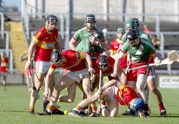 Borris/Kilcotton and The Harps scramble to win possession of the sliotar in their SHC quarter-final Photo: Denis Byrne Borris/Kilcotton and The Harps scramble to win possession of the sliotar in their SHC quarter-final Photo: Denis Byrne