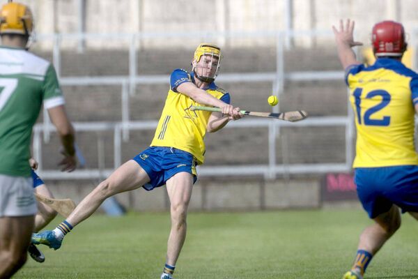 Cillian Byrne (Abbeyleix) playing for a score against Rosenallis 	 Photo: Denis Byrne