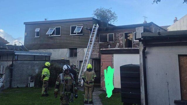 <p>Firefighters at the scene after the blaze was brought under control. Photo: Portarlington 4th Laois Scouts </p>