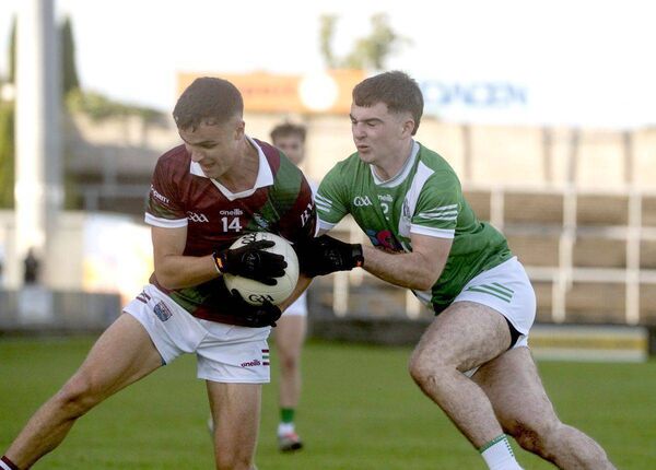 Ronan Coffey (Portarlington) holding off this challenge Killeshin's Jack Brennan in the SFC semi-final at Laois Hire O'Moore Park Photo: Denis Byrne Ronan Coffey (Portarlington) holding off this challenge Killeshin's Jack Brennan in the SFC semi-final at Laois Hire O'Moore Park Photo: Denis Byrne