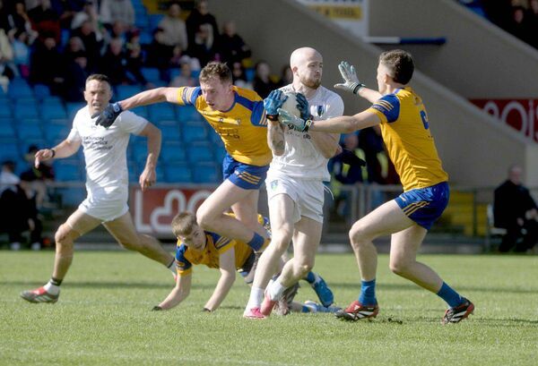 Cian Doyle (Courtwood) hangs on to possession despite being put under pressure by St Joseph's Mikie Dempsey and Jack Lacey in the SFC semi-final on Sunday Photo: Denis Byrne Cian Doyle (Courtwood) hangs on to possession despite being put under pressure by St Joseph's Mikie Dempsey and Jack Lacey in the SFC semi-final on Sunday Photo: Denis Byrne