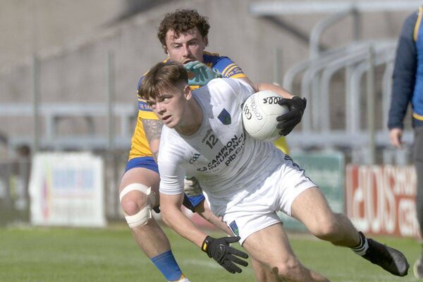Tadhg Slattery (Courtwood) keeping this ball safe as Josh Lacey (St. Josephs) looks to challenge in their SFC semi-final Photo: Denis Byrne Tadhg Slattery (Courtwood) keeping this ball safe as Josh Lacey (St. Josephs) looks to challenge in their SFC semi-final Photo: Denis Byrne