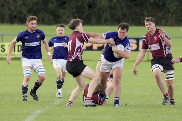 A determined Liam Doyle makes ground supported by Michael Rigney and Jakle Byrne against Roscrea on Sunday 	Photo: David Maher