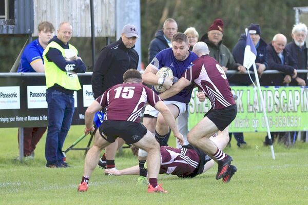 Mike Byrne is determined it will take everything Roscrea can throw at him to stop his progress 	 Photo: David Maher