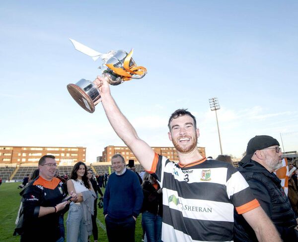 Slieve Bloom captain, Sean Nolan raises The Hetherington Cup Photo: Denis Byrne Slieve Bloom captain, Sean Nolan raises The Hetherington Cup Photo: Denis Byrne
