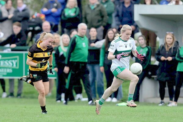 Portlaoise's Laura Nerney races away from Lisa Keane (The Heath) in the LGFA JC 'A' final 	 Photo: David Maher