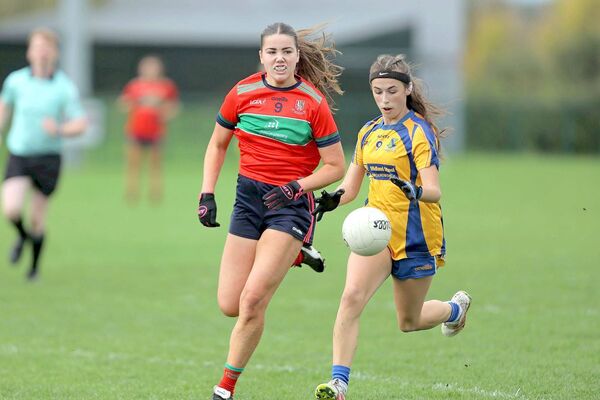 Sarsfields' Leah Farrell with Timahoe's Sarah Deegan giving chase in the LGFA JC 'B' final Photo: David Maher Sarsfields' Leah Farrell with Timahoe's Sarah Deegan giving chase in the LGFA JC 'B' final Photo: David Maher