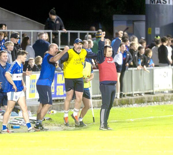 Castletown manager Ger Cuddy and team officials cannot hole back their delight at the final whistle of the PIHC final 	Photo: Denis Byrne