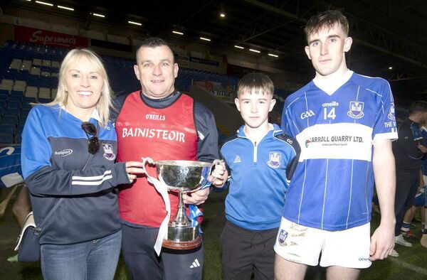 Ger and Kyron Cuddy and family celebrate PIHC final win 	 Photo: Denis Byrne