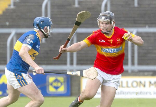 Eoghan Murphy (Harps) looking go past Joe Corby (Clough/Ballacolla) in the Laois Shopping Centre Senior Hurling semi-final at Laois Hire O'Moore Park on Sunday Photo: Denis Byrne Eoghan Murphy (Harps) looking go past Joe Corby (Clough/Ballacolla) in the Laois Shopping Centre Senior Hurling semi-final at Laois Hire O'Moore Park on Sunday Photo: Denis Byrne